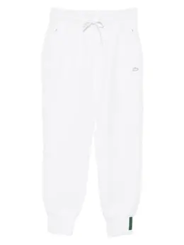 Lacoste: Белые брюки 