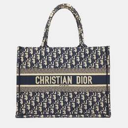 Dior: Бежевая сумка-шоппер 