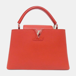 Louis Vuitton: Помаранчеві сумки 