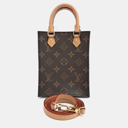 Louis Vuitton: Коричневая сумка 