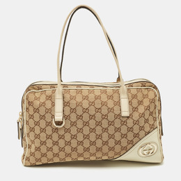 Gucci: Бежевая сумка  GG