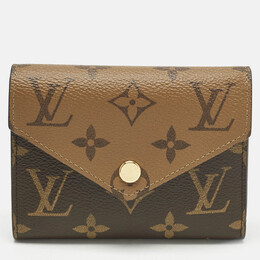 Louis Vuitton: Коричневый кошелёк 