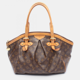 Louis Vuitton: Коричневая сумка 