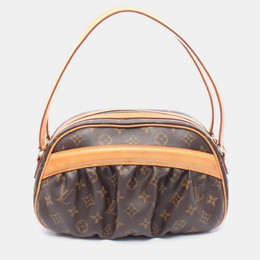Louis Vuitton: Коричневая сумка 