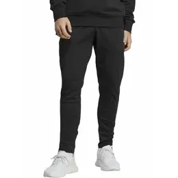 adidas: Спортивные брюки  Essentials
