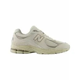 New Balance: Серые кроссовки 