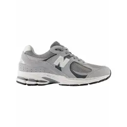 New Balance: Серые кроссовки 