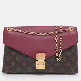 Louis Vuitton: Коричневая сумка 