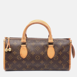 Louis Vuitton: Коричневая сумка 