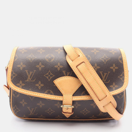 Louis Vuitton: Коричневая сумка 