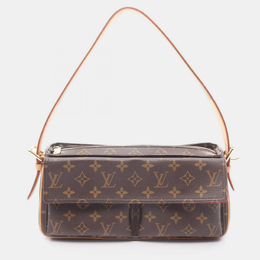 Louis Vuitton: Коричневая сумка 