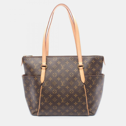 Louis Vuitton: Коричневая сумка 