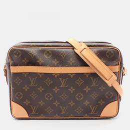 Louis Vuitton: Коричневая сумка через плечо 