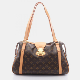 Louis Vuitton: Коричневая сумка 