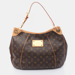 Louis Vuitton: Коричневая сумка 
