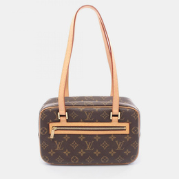Louis Vuitton: Коричневая сумка 