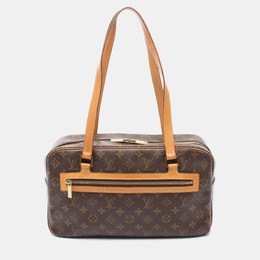 Louis Vuitton: Коричневая сумка 