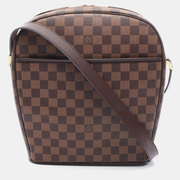 Louis Vuitton: Коричневая сумка 