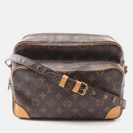 Louis Vuitton: Коричневая сумка 