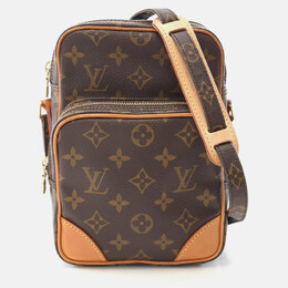 Louis Vuitton: Коричневая сумка 