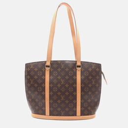 Louis Vuitton: Коричневая сумка 