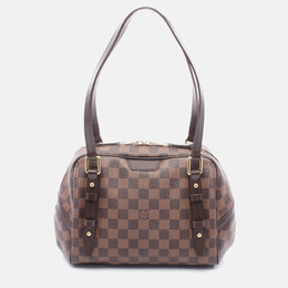 Louis Vuitton: Коричневая сумка 