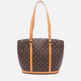 Louis Vuitton: Коричневая сумка 