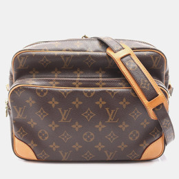 Louis Vuitton: Коричневая сумка 