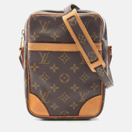Louis Vuitton: Коричневая сумка через плечо 