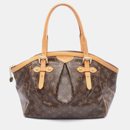 Louis Vuitton: Коричневая сумка 
