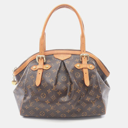 Louis Vuitton: Коричневая сумка 