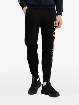 Ea7 Emporio Armani: Чёрные брюки 