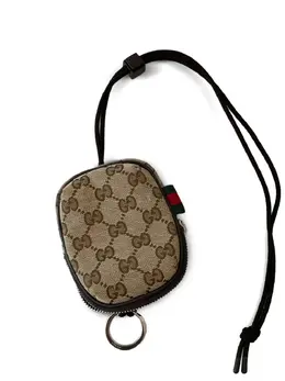 Gucci: Бежевый кошелёк  GG