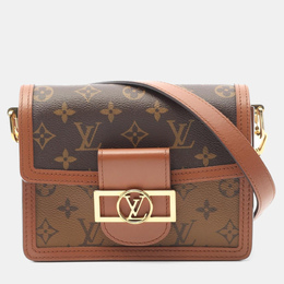 Louis Vuitton: Коричневая сумка 