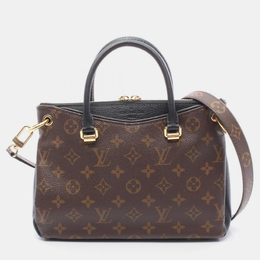 Louis Vuitton: Коричневая сумка 