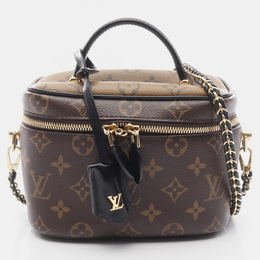 Louis Vuitton: Коричневая сумка 