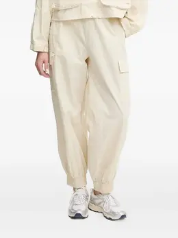 Ea7 Emporio Armani: Белые брюки 