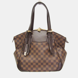 Louis Vuitton: Коричневая сумка 
