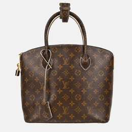 Louis Vuitton: Блестящая сумка  Lockit PM