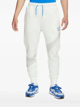 Nike: Белые брюки  Swoosh