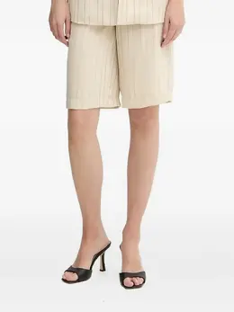 Armani Exchange: Бежевые шорты 