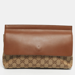 Gucci: Бежевая поясная сумка  GG