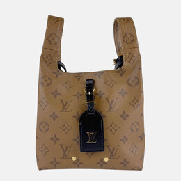 Louis Vuitton: Коричневая сумка 