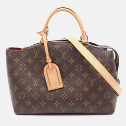Louis Vuitton: Коричневая сумка 