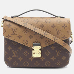 Louis Vuitton: Коричневая сумка  Pochette