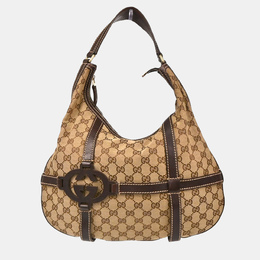 Gucci: Бежевая сумка  GG