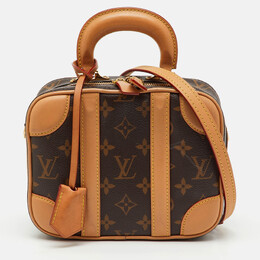 Louis Vuitton: Коричневая сумка 