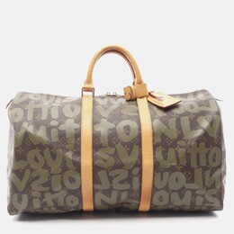 Louis Vuitton: Коричневая сумка на руку 