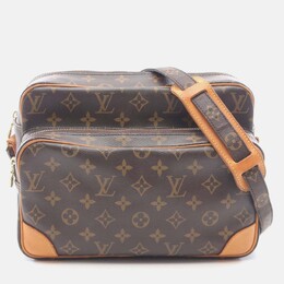Louis Vuitton: Коричневая сумка через плечо 