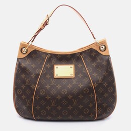 Louis Vuitton: Коричневая сумка 